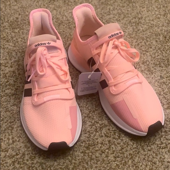pink black and white adidas